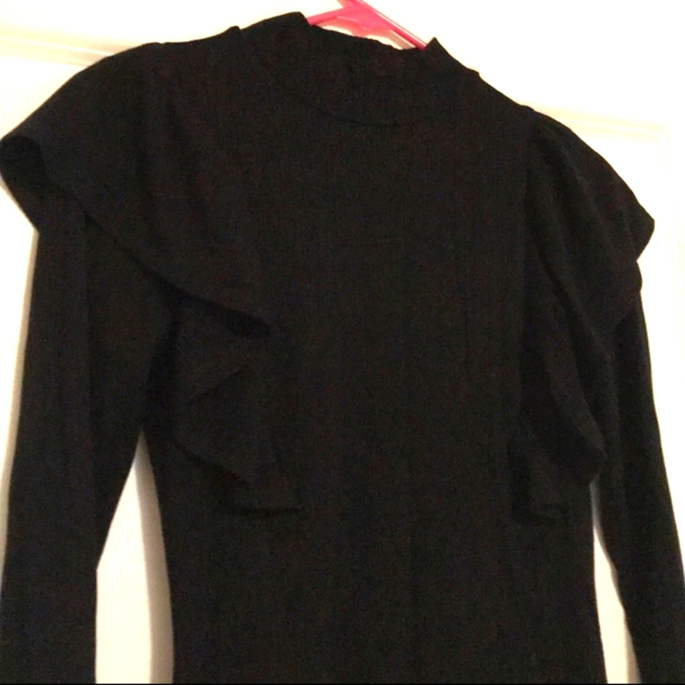 Black form fitting dress w/ruffle shoulder accent